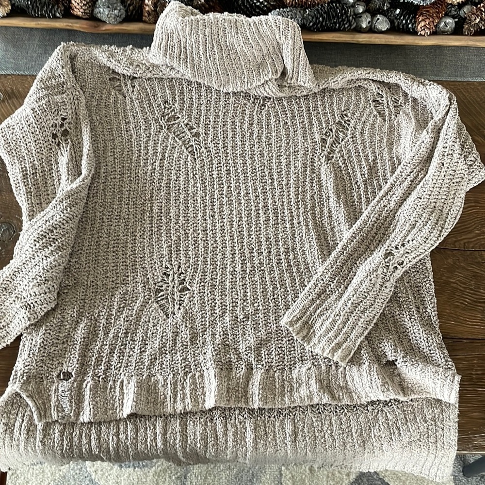 Distressed tunic sweater